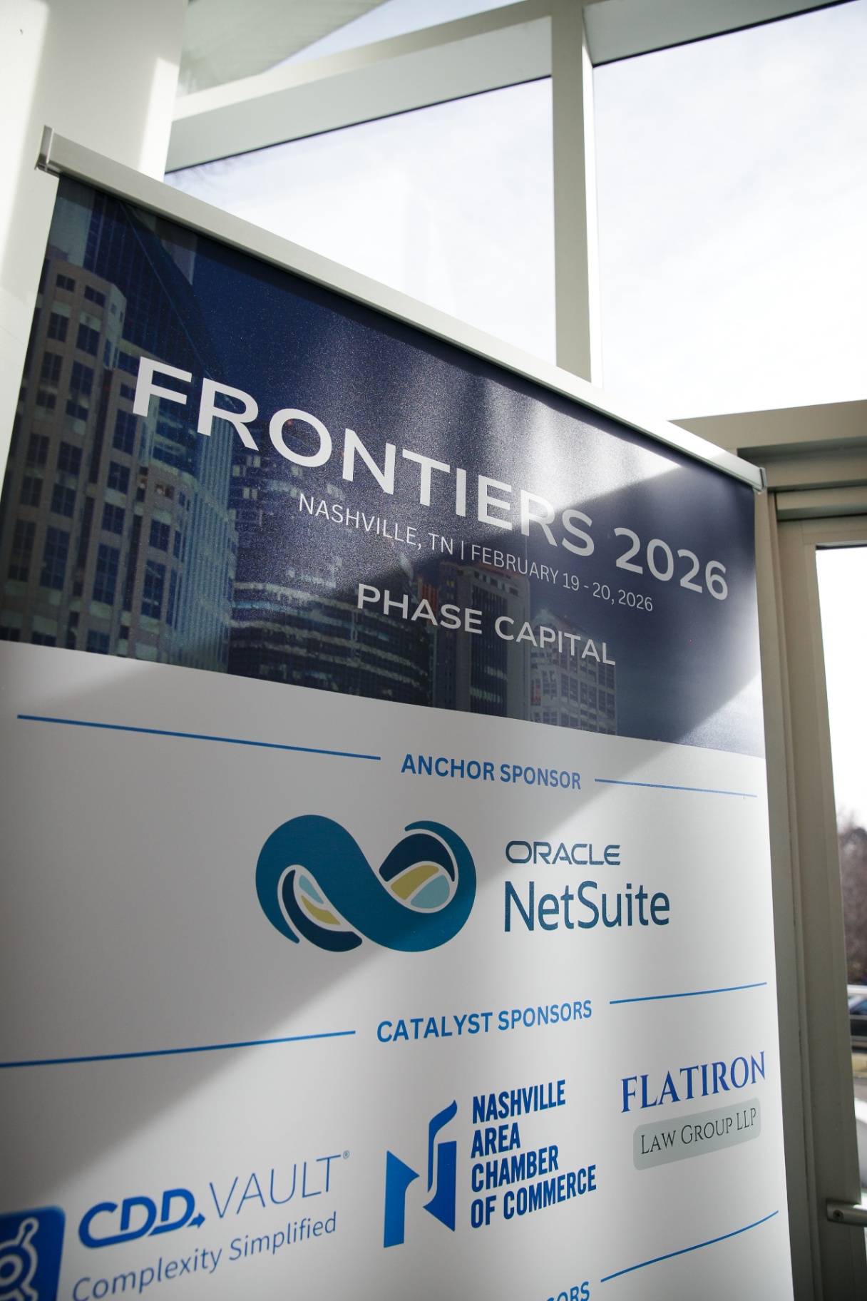 Frontiers 2026 sponsor banner in the Noah Liff Opera Center lobby