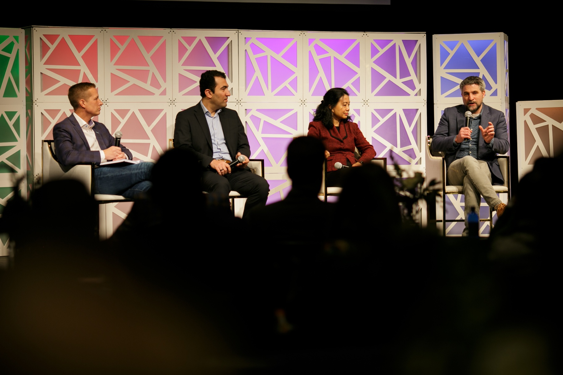 Four panelists seated on stage in conversation at Frontiers 2026